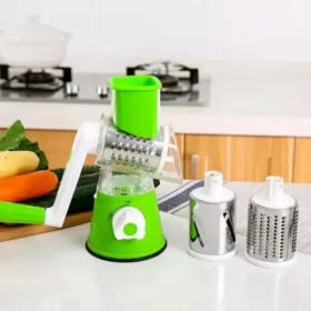 Manual vegetable cutter and slicer with interchangeable blades.